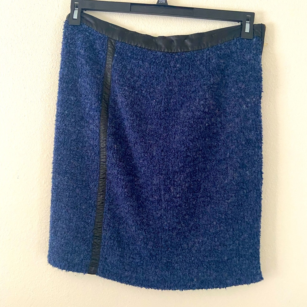 Blue business skirt with leather stripe.